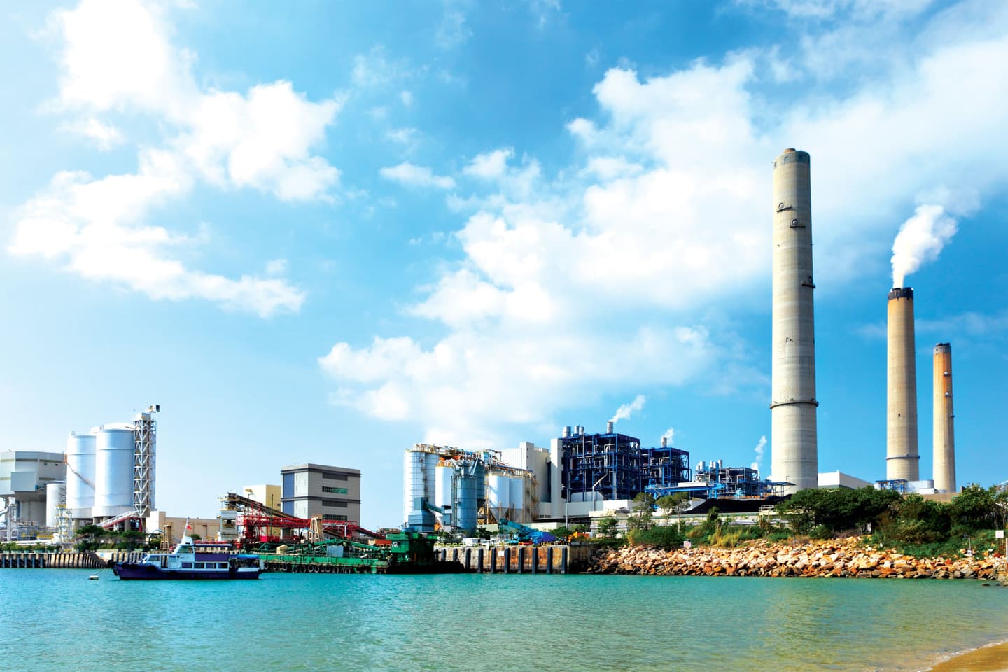 industrial-plant-on-the-water-with-clear-skies-2026-09-15-20-02-13-utc.jpg