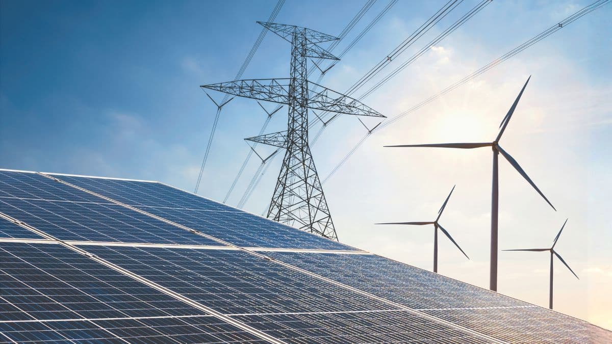 Solar and wind infrastructure connected to the grid, illustrating the scale of modern renewable energy systems.